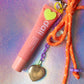 Bow Key Charm with Dali Lip Balm