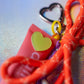 Bow Key Charm with Dali Lip Balm