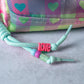 Checkered Hearts Puffy Pouch
