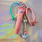 Ballerina Key Charm with pink ballet shoe, pastel beads, and strawberry milkshake lip balm