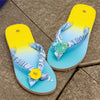 blue bandana flip flops with hi charm on tiled floor