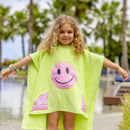 bandana smiley poncho curious lime kids beach poncho front view by pool