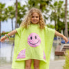 bandana smiley poncho curious lime kids beach poncho front view by pool