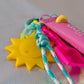 Beach Key Charm with yellow sun pendant pink shovel charm and aqua cord