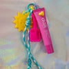 Beach Key Charm featuring yellow sun pendant pink shovel charm aqua cord and pink Dali lip balm