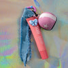 Biker Girl Key Charm with pink helmet, denim strap and strawberry lip balm