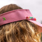 side view of beaded trim on kids pink visor
