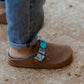 Outdoor shot of kids wearing cool bandana slip-on shoes in sky blue with casual denim styling