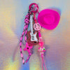 Full view of the chunky keychain featuring a neon pink Cowboy Hat Keyring and a pink glitter electric guitar charm
