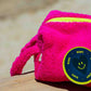 Side view of Curious Bright Pink Towel Puffy cosmetic bag with carry handle