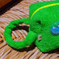 Side detail of Curious Lime towel travel pouch with soft loop handle