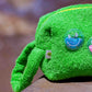 Close-up of Curious Lime towel toiletry bag showing textured terry fabric and handle