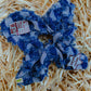 Top view of the denim checkered oversized scrunchie