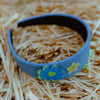 Denim wide headband with blue flower and star embellishments
