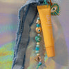 Eye Key Charm with beads denim ribbon and yellow lip balm