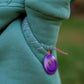 Hand stitch detail with purple smiley button on mint green kids fleece jogger set