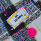 Plaid navy and bright pink Big Dreamer scarf with stitched label and hanging smiley charm