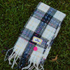 Plaid Big Dreamer scarf in navy and bright pink with stitched label and smiley charm