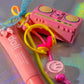 Pink Please Don't Stop The Music key charm with headphones and boombox