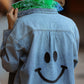 Back smiley print on the Pocket Full of Dreams denim shirt