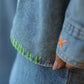 Hand stitch detail on the Pocket Full of Dreams denim shirt