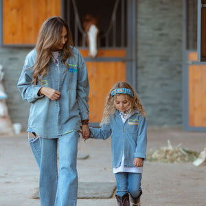 Adult and child wearing the Pocket Full of Dreams denim shirt