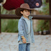 Kid wearing Pocket Full of Dreams light blue denim shirt with cowboy hat outdoors