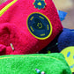 Hot Pink towel puffy cosmetic bag with heart smiley patch and flower badge
