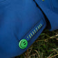 Green smiley badge and hand stitch detail on leg of denim blue kids joggers